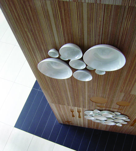 Plexwood® Måltidets Hus cnc milled hallway elevator wall in re-designed meranti plywood veneers