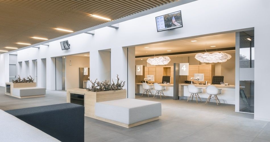 Plexwood® City hall of Montferland Didam public services booths and waiting area in the main entrance hall