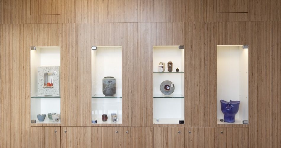 Plexwood® De Nieuwe Ooster wall display and storage cabinet of composite edge birch sandwich ply veneer