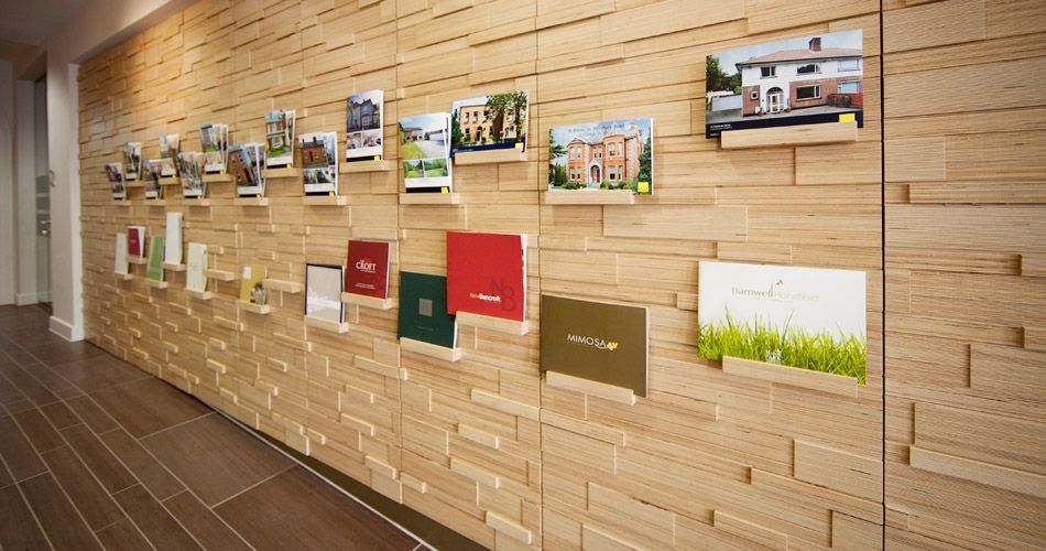 Plexwood® Savills HQ relief wall brochure display in birch resurfaced veneer ply